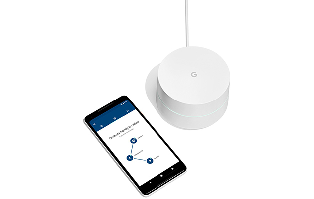 Mesh-verkon asennus on yllättävän helppoa Google WiFi -reititin älypuhelimen vieressä.