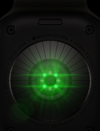 Apple Watch Ultra 4, taustapuoli, titaanikuori, värinä musta, useita pyöreitä antureita ja hehkuvia vihreitä LED-valoja