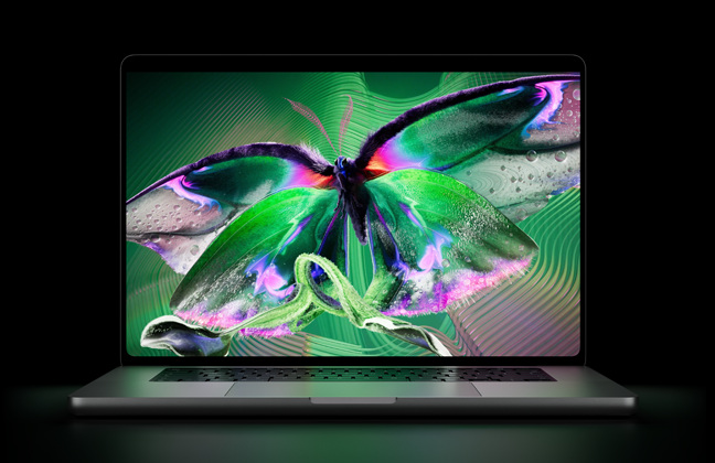 MacBook Pro PROLED XDR ‑näytöllä, kansi avoinna, värinä hopea, näytöllä yksityiskohtainen kuva, jossa suuri kontrasti ja kirkkaat värit, näyttö valaisee näppäimistön