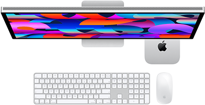 Mac mini sijoitettuna Studio Displayn alle, Magic Keyboard numeronäppäimistöllä, Magic Mouse