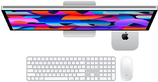 Mac mini sijoitettuna Studio Displayn alle, Magic Keyboard numeronäppäimistöllä, Magic Mouse
