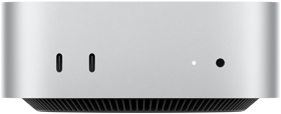 Mac mini edestä, hopeanvärinen runko, kaksi USB-C-porttia, virtapainike, merkkivalo, alareunassa jäähdytysritilä