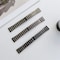 Kaksivärinen ranneke Samsungin ja Huawein älykelloille 20 mm - Musta / hopea
