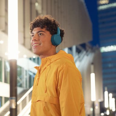 Korvassa olevat Bluetooth-kuulokkeet Siniset