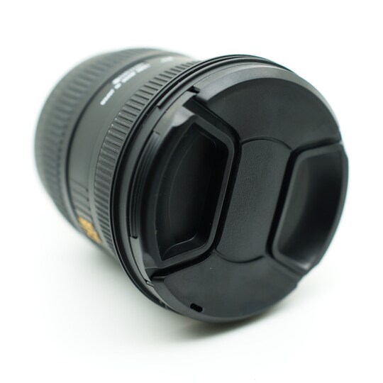 Yleiskäyttöinen linssinsuojus hihnalla Canon Nikon Sony Pentax SLR-kameroihin 58 mm