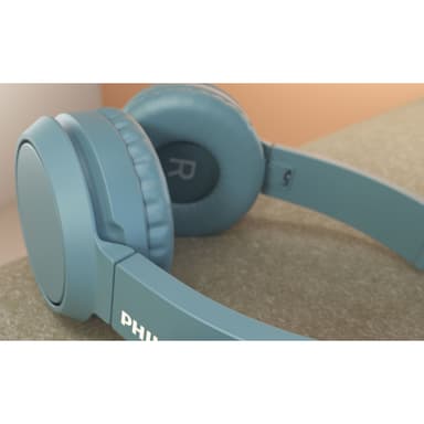Korvassa olevat Bluetooth-kuulokkeet Siniset