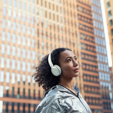 Korviin kiinnitettävät Bluetooth-kuulokkeet Valkoiset