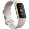 Fitbit Charge 5 aktiivisuusranneke (Lunar White/Soft Gold)