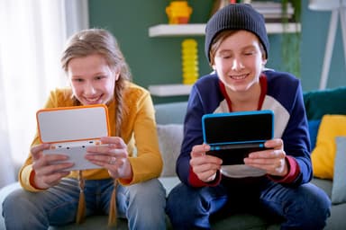 New Nintendo 2DS XL (valkoinen/oranssi) EU-malli