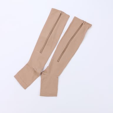 Kompressiosukat vetoketjulla ja avoimella kärjellä nylon/spandex beigeä kokoa S/M 1 pari