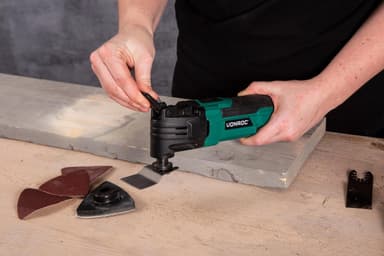 Oszillierendes Multitool 300W - Schnellwechselsystem, variable Geschwindigkeit - Komplettset inkl. 61 Zubehörteile und Aufbewahrungstasche
