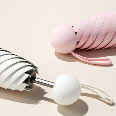 Vakaa sateenvarjo Anti-UV taitettava Kompakti kapselikotelolla