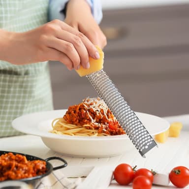 Raastin ruostumattomasta teräksestä juustoraastin