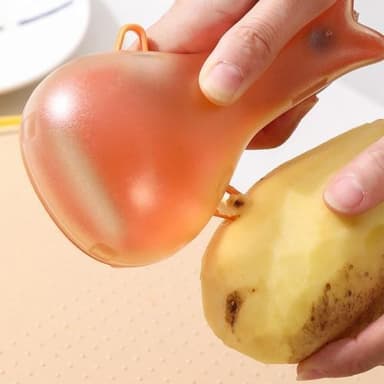 Monikäyttöinen hedelmänkuorija ruostumattomasta teräksestä valmistetut kuorintalaitteet Keittiötyökalu