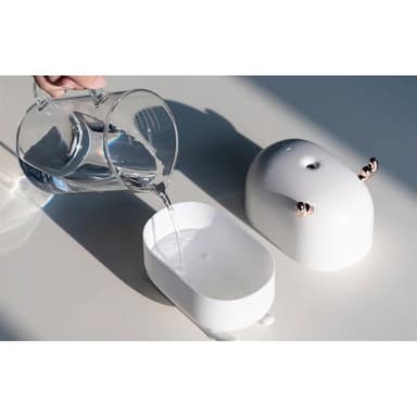 Rauhoittava ilmankostutin, jossa on LED hirvieläinten muotoilussa
