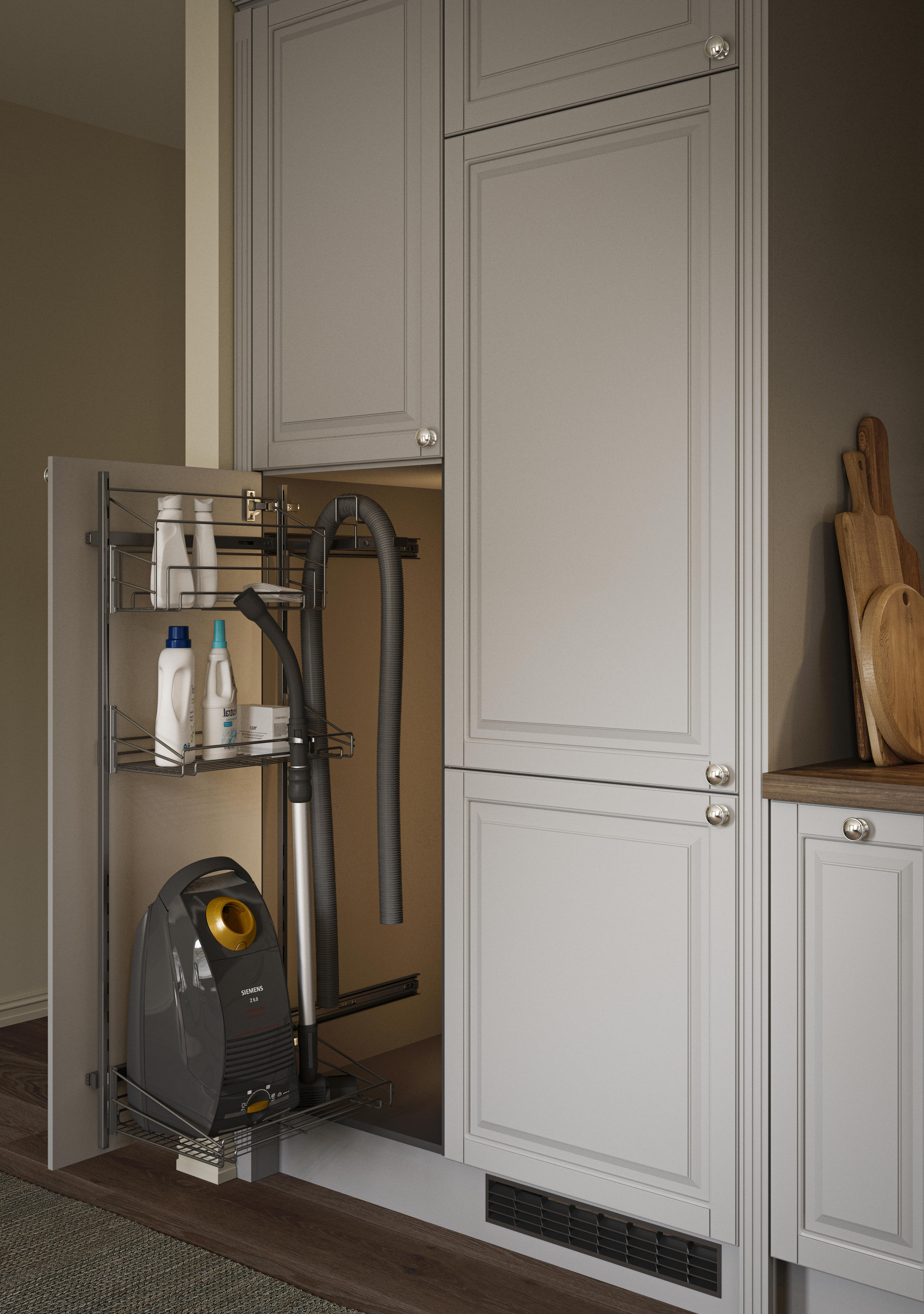 Heritage Light Grey -keittiön ulosvedettävä siivoustarvikkeiden säilytysratkaisu, jossa säilytetään pesuaineita sekä pölynimuria