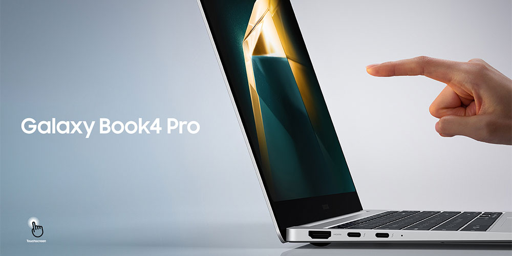 Galaxy Book4 Pro -tietokone värissä platinum silver ja käsi, joka on juuri koskettamassa ruutua