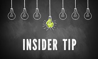 Taululle piirretty 7 hehkulamppua, joista keskimmäinen palaa ja sen alla on teksti "Insider tip"