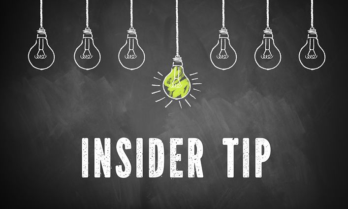 Taululle piirretty 7 hehkulamppua, joista keskimmäinen palaa ja sen alla on teksti "Insider tip"