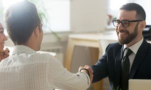 Couple in a meeting with a man