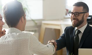 Couple in a meeting with a man