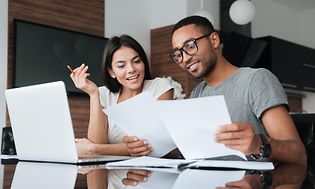 Couple looking at papers