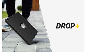 Tabletti suojakotelolla pudotettu maahan ja teksti DROP+