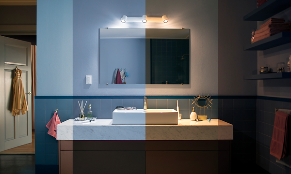 Philips Hue Adore-spottivalolista peilin yläpuolella