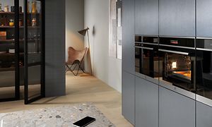 Integroitu Electrolux-uuni harmaassa keittiössä