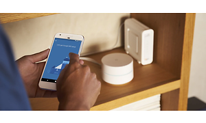 Computing - Smart home - Man installing Google mesh network - 1260x600