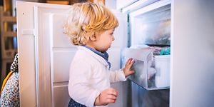 MDA-Freezers-Little boy opening  a freezer