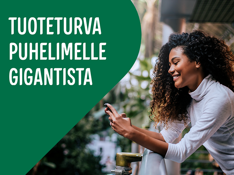 Tuoteturva puhelimelle Gigantista -teksti ja nainen, joka katselee puhelintaan