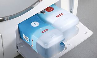 Miele-pyykinpesukoneen pesuaineenannostelujärjestelmä
