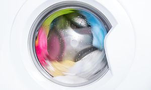 MDA-Washing machine-Pyykinpesukone, jossa on pyykkiä