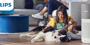 Philips air-ilmanpuhdistin, jonka vieressä on lapsi ja koira