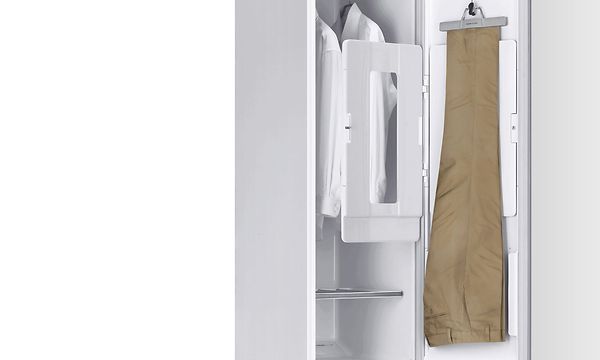 Light brown pants haning in the LG Styler