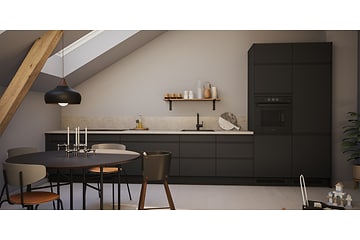Moderni Epoq-keittiö, jossa mustat kaapistot ja beigen värinen työtaso
