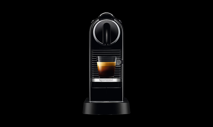 Nespresso Original -kahvikone mustalla taustalla