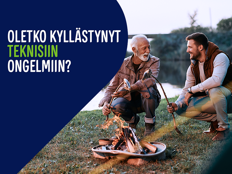 Vanhempi ja nuorempi mies nuotion äärellä metsässä