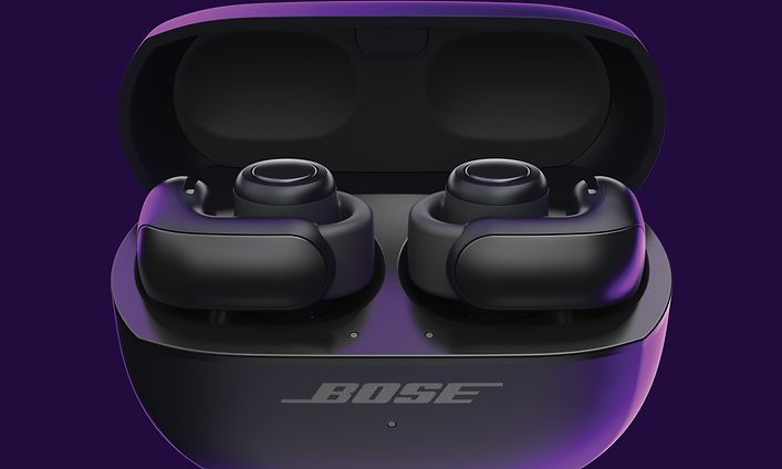 Avoimet Bose Ultra -nappikuulokkeet violettia taustaa vasten