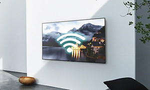 Seinälle kiinnitetty smart-TV, jossa wifi-symboli