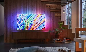 TV with ambilight has many abstract colors on screen and backlighting