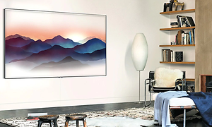 QLED TV as artwork in a cosy living room