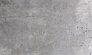 Lähikuva betoniseinästä, jossa näkyy sen rakenne